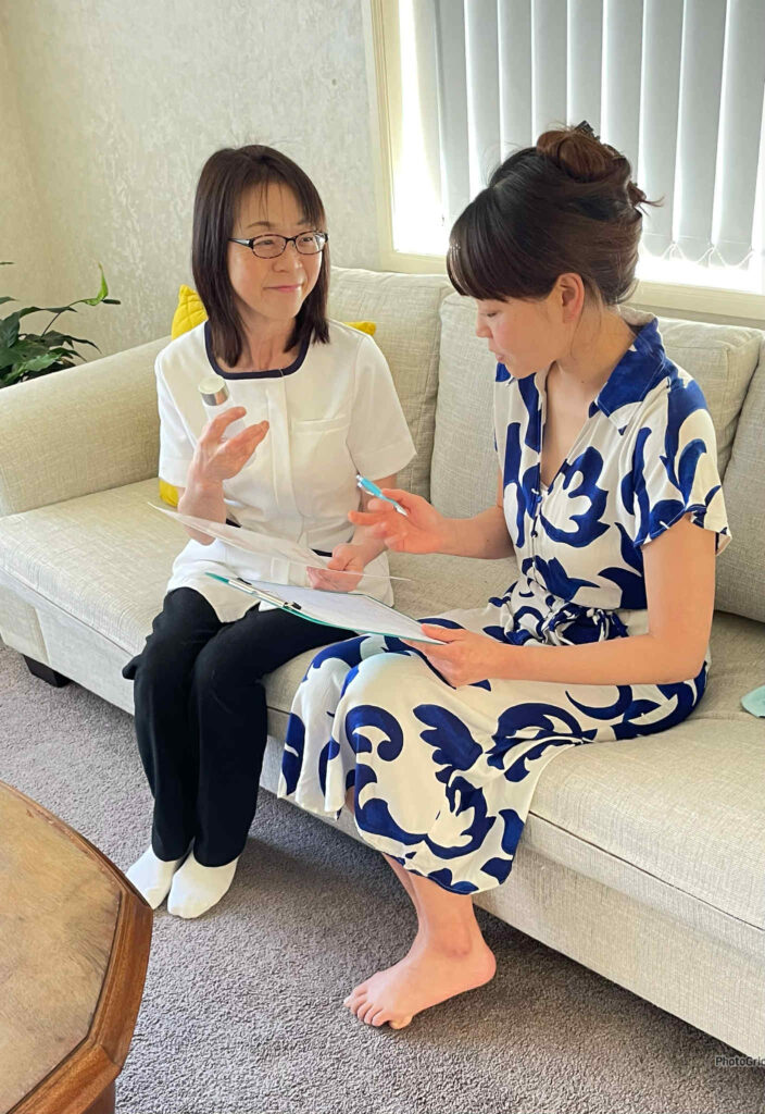Therapist talking with a client before a session